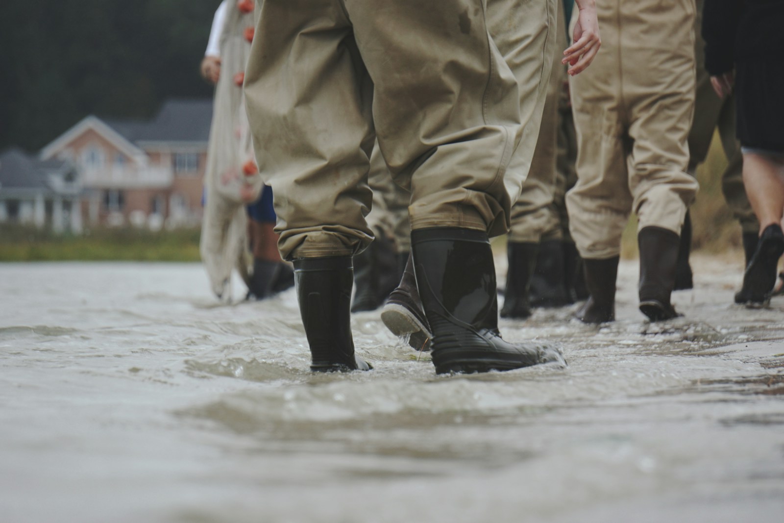 person standing in flooded streets