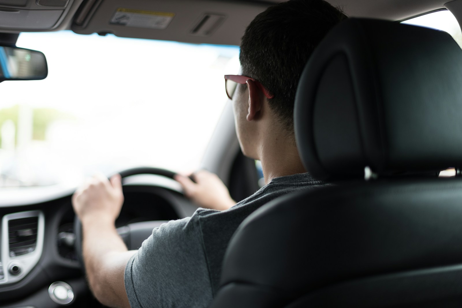 man driving car during daytime auto, dui